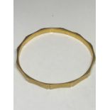 A MARKED 9 CARAT GOLD BANGLE GROSS WEIGHT 8.9 GRAMS