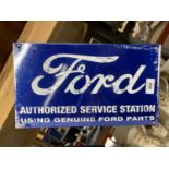 A FORD METAL SIGN 35.5CM X 20.5CM