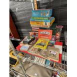 A LARGE ASSORTMENT OF CHILDRENS TOYS AND GAMES TO INCLUDE SCRABBLE, MONOPOLY AND POCKET SIMON ETC