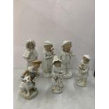 SIX STONEWARE FIGURINES OF BOYS AND GIRLS