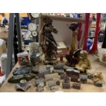 A COLLECTION OF ITEMS TO INCLUDE MINIATURE WADE COTTAGES, METAL STATUETTE OF A LADY, CERAMIC CAT,