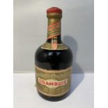 A VINTAGE BOTTLE OF PRINCE CHARLES EDWARD'S LIQUEUR DRAMBUIE 35% VOL