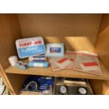 A VINTAGE AND RETRO JOHNSON & JOHNSON FIRST AID KIT BELIEVED COMPLETE BUT NO WARRRANTY GIVEN