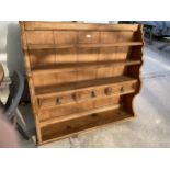 A MODERN PINE PLATE RACK 48" WIDE