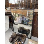 A LARGE DECORATIVE WROUGHT IURON FRAMED WALL MIRROR (141CM X 98CM)