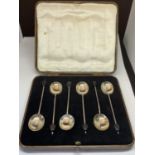 A BOXED SET OF SIX HALLMARKED SHEFFIELD COFFEE BEAN SPOONS