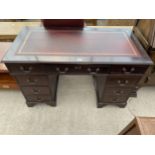 A REPRODUCTION TWIN-PEDESTAL DESK WITH EIGHT DRAWERS AND INSET LEATHER TOP, 48X24"