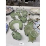 A QUANTITY OF FROSTED GREEN GLASSWARE FOR FLOWER ARRANGING INCLUDING HORSESHOE SHAPED ROUND, ETC