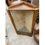 A SHINY WALNUT CORNER DISPLAY CABINET WITH TWO SLIDING DOORS, 27.5" WIDE