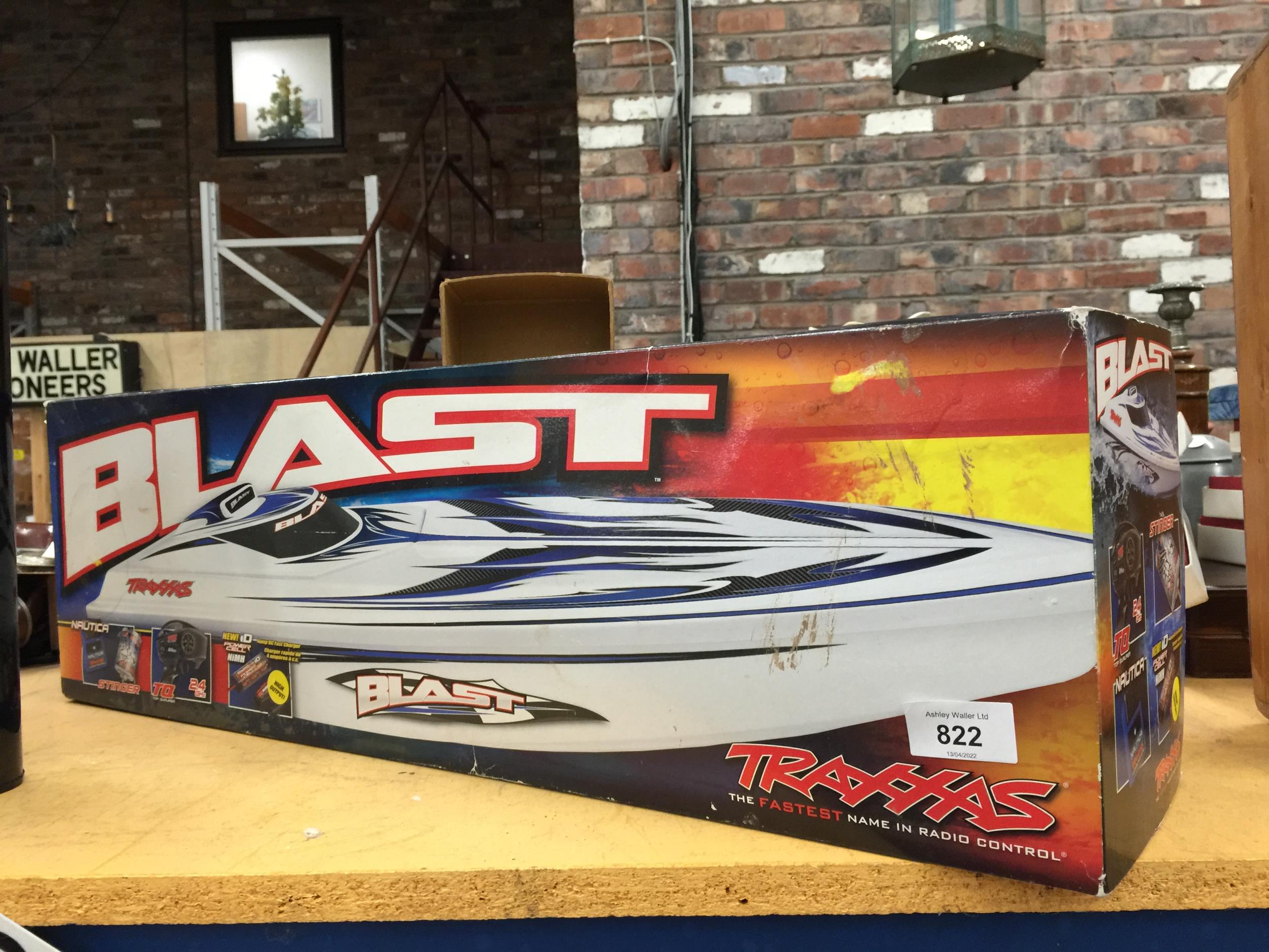 A BOXED TRAXXAS BLAST SPEED BOAT