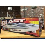 A BOXED TRAXXAS BLAST SPEED BOAT