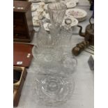 A QUANTITY OF CUT GLASS CRYSTAL GLASS TO INCLUDE VASES, BOWLS, DECANTERS, ETC