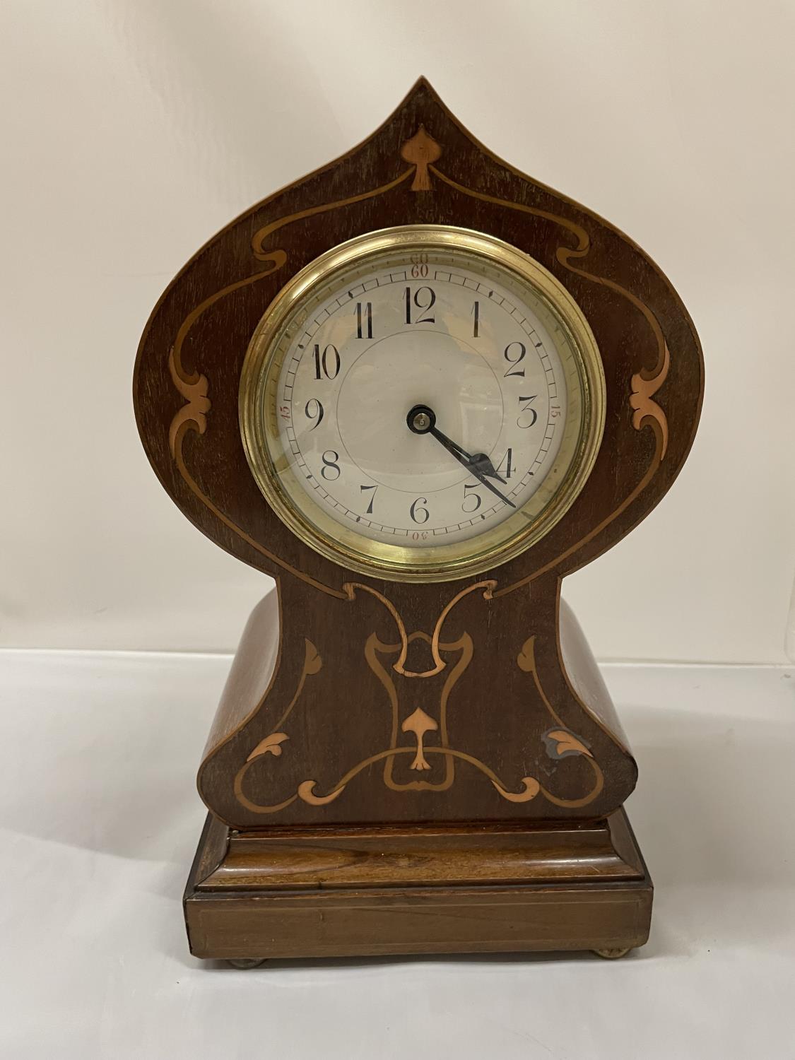 AN EDWARDIAN INLAID MANTLE CLOCK