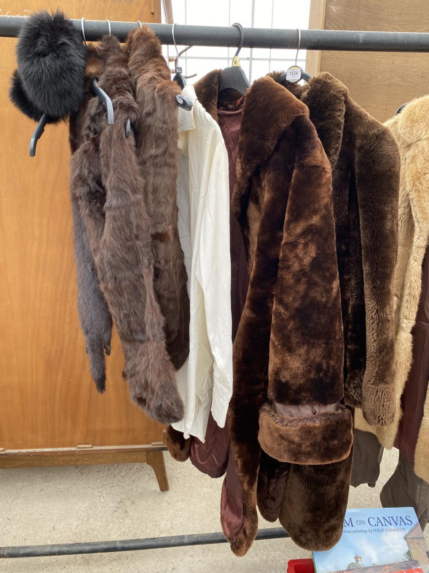 AN ASSORTMENT OF LADIES FUR COATS AND STOLES