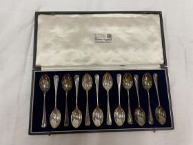 A BOXED SET OF TWELVE HALLMARKED LONDON SILVER SPOONS