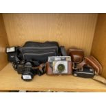 AN ASSORTMENT OF PHOTOGRAPH EQUIPMENT TO INCLUDE A CHINON CE-4 CAMERA, A SUPER SILETTE-LK CAMERA AND