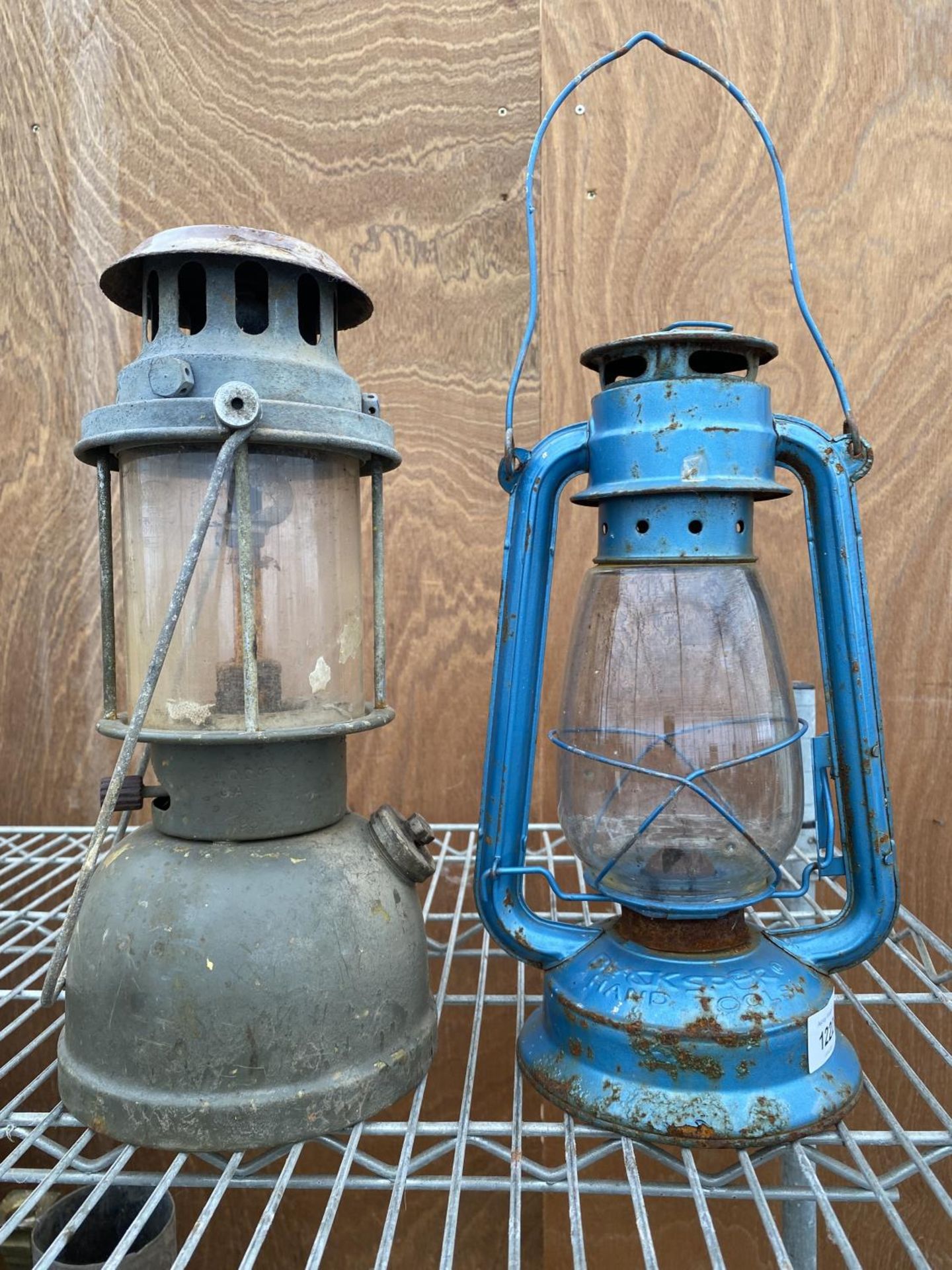 TWO VINTAGE MID CENTURY PARAFIN LAMPS ONE BEARING THE MARK VAPALUX AND THE OTHER BEARING THE LABEL