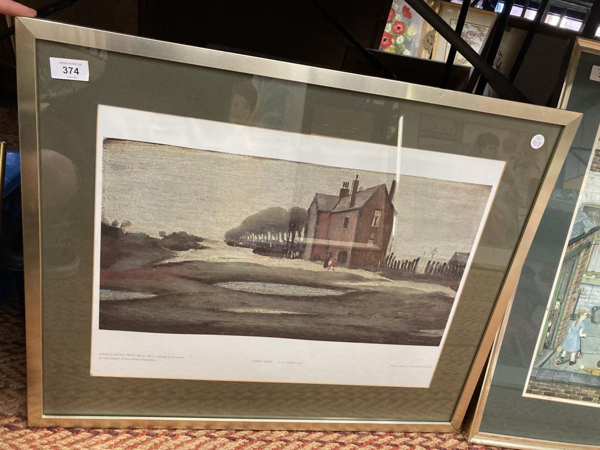 A FRAMED PRINT OF 'LONELY HOUSE' BY L. S. LOWRY 1946 W: 67CM