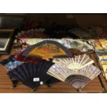A COLLECTION OF FANS COLLECTED FROM VARIOUS COUNTRIES