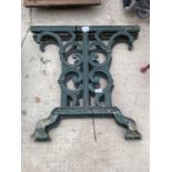 A PAIR OF DECORATIVE CAST IRON TABLE BASE LEGS