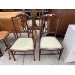 AN EDWARDIAN MAHOGANY AND INLAID ELBOW CHAIR AND SIMILAR BEDROOM CHAIR