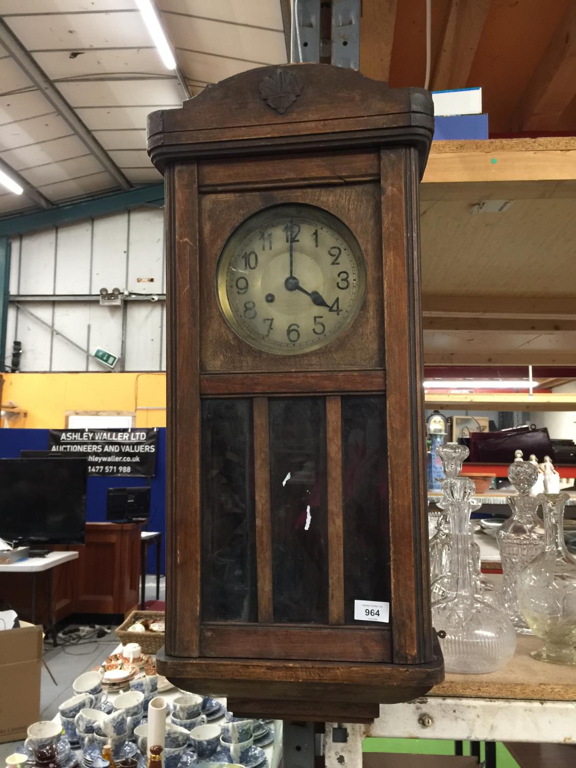 A MAHOGANY CASES WALL CLOCK WITH GLASS FRONT, APPROX 75CM X 33CM