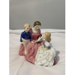 A ROYAL DOULTON FIGURE 'THE BEDTIME STORY' HN2059