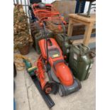 AN ASSORTMENT OF TOOLS TO INCLUDE TWO VINTAGE JERRY CANS, A FLYMO CHEVRON LAWN MOWER AND A HEDGE