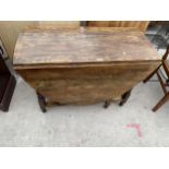 AN EARLY 20TH CENTURY OAK BARLEYTWIST GATELEG DINING TABLE