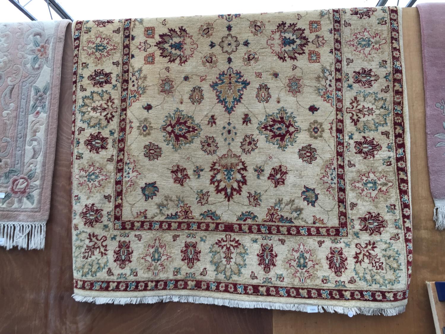 A HAND KNOTTED 100% WOOL PAKISTAN RUG 212CM X 149CM