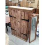 A PINE TWO DOOR CABINET, MIRROR AND FRAME DRIED FRUIT PICTURE