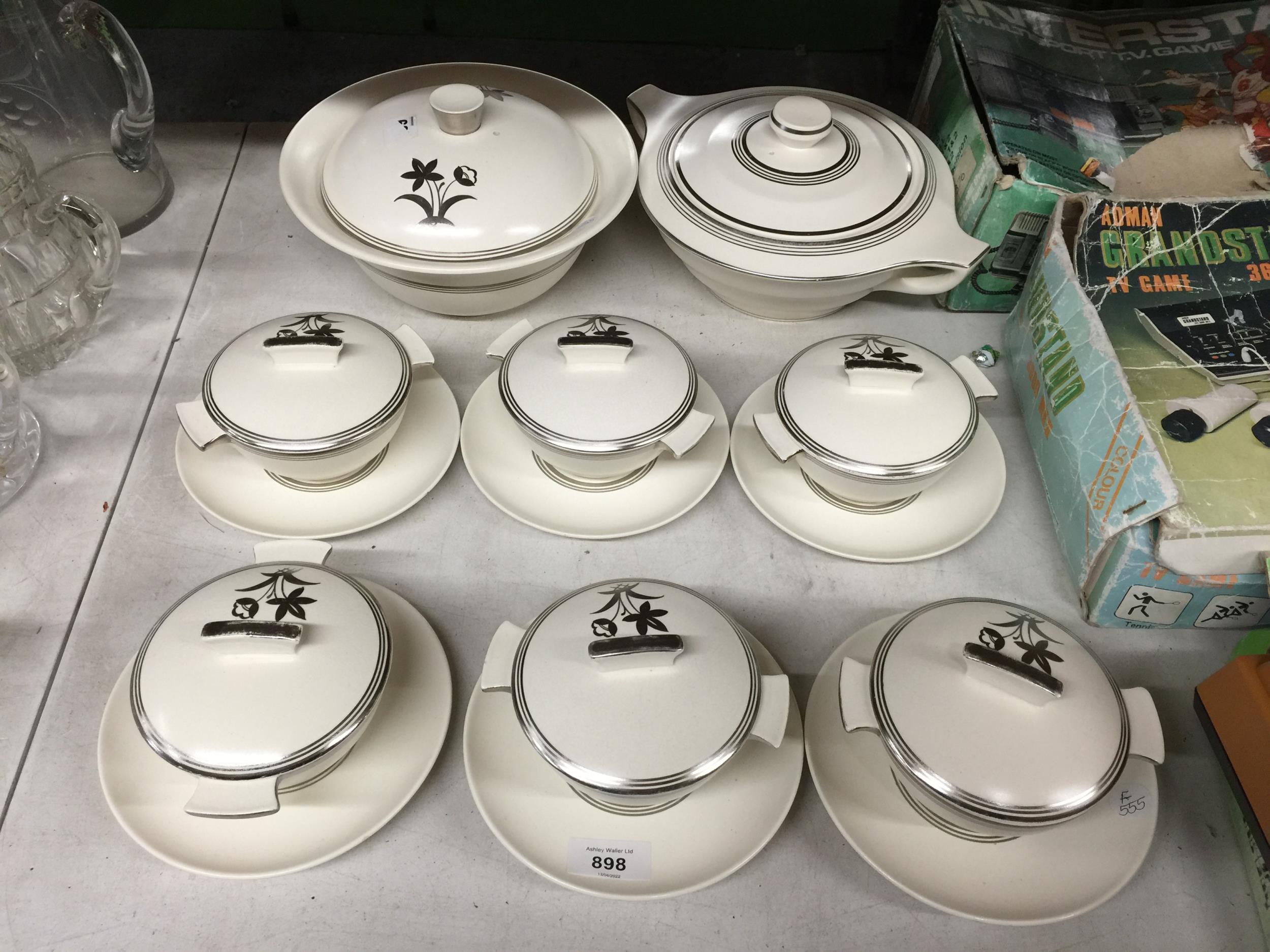 AN AMOUNT OF WEDGWOOD 'MOONSTONE' INCLUDING LIDDED SOUP BOWLS AND SAUCERS AND TWO LIDDED TUREENS