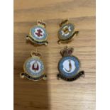 FOUR MILITARY BADGES