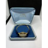 A JUNGHANS WWII WRIST WATCH SEEN WORKING BUT NO WARRANTY IN A PRESENTATION BOX