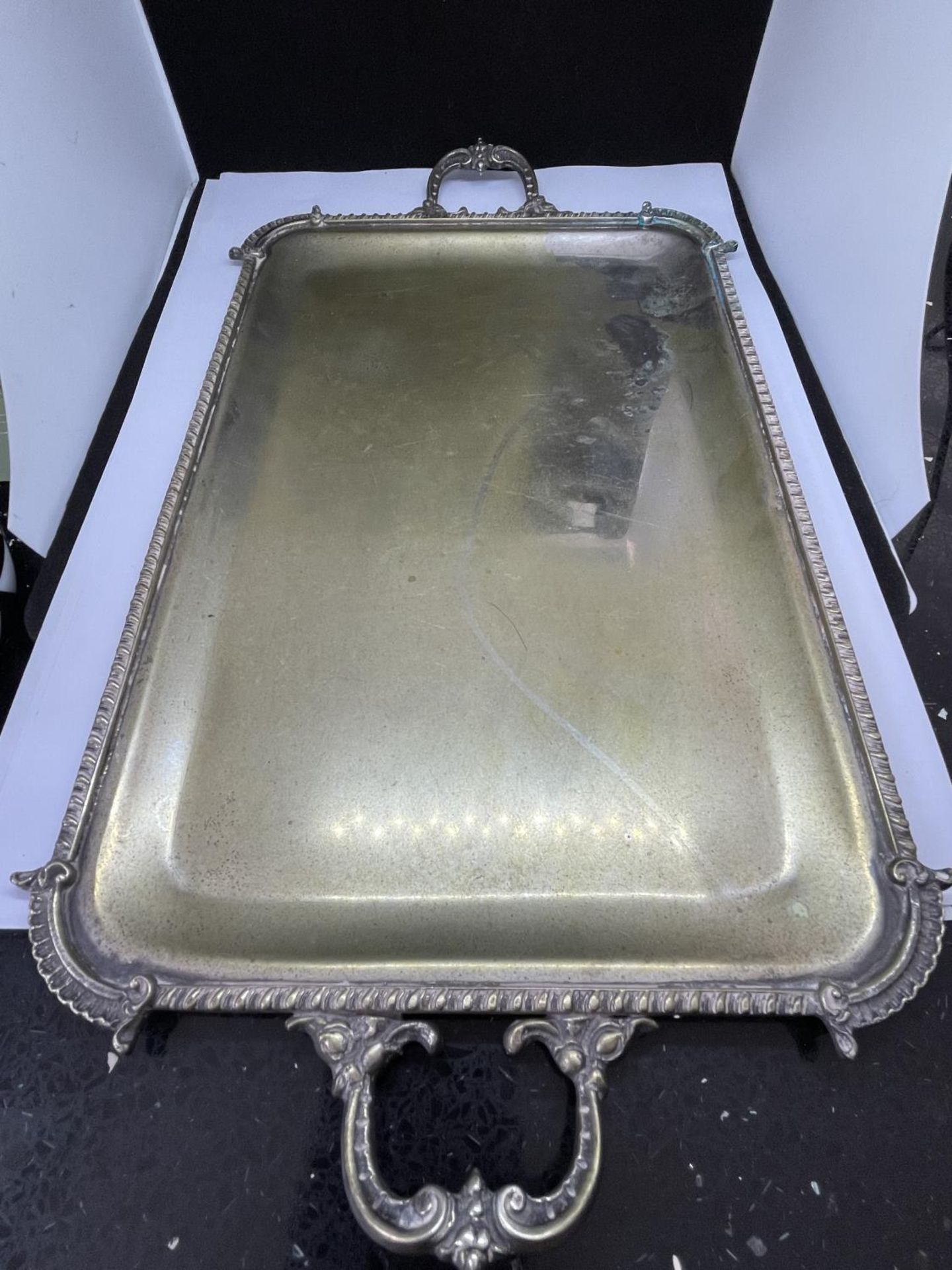 A POSSIBLY SILVER SANDWICH TRAY GROSS WEIGHT 487 GRAMS