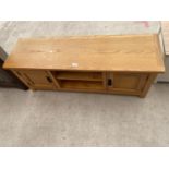 AN OAK MEDIA UNIT, 47" WIDE