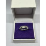 A HEAVY HALLMARKED BIRMINGHAM SILVER RING IN A PRESENTATION BOX