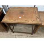 AN EARLY 20TH CENTURY OAK BARLEYTWIST JACOBEAN STYLE CENTRE TABLE, 30X22"