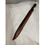A 'TRIBAL' STYLE WOODEN CARVED KNIFE LENGTH 62CM