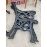 A PAIR OF DECORATIVE CAST IRON BENCH ENDS