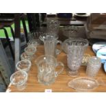 A COLLECTION OF GLASSWARE INCLUDING VASES, DESSERT BOWLS, BOWLS, ETC