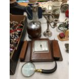 A SILVER PLATED CANDLEABRA, SILVER PLATED CLARET JUG, ICE BUCKET, MAGNIFYING GLASS AND BAROMETER