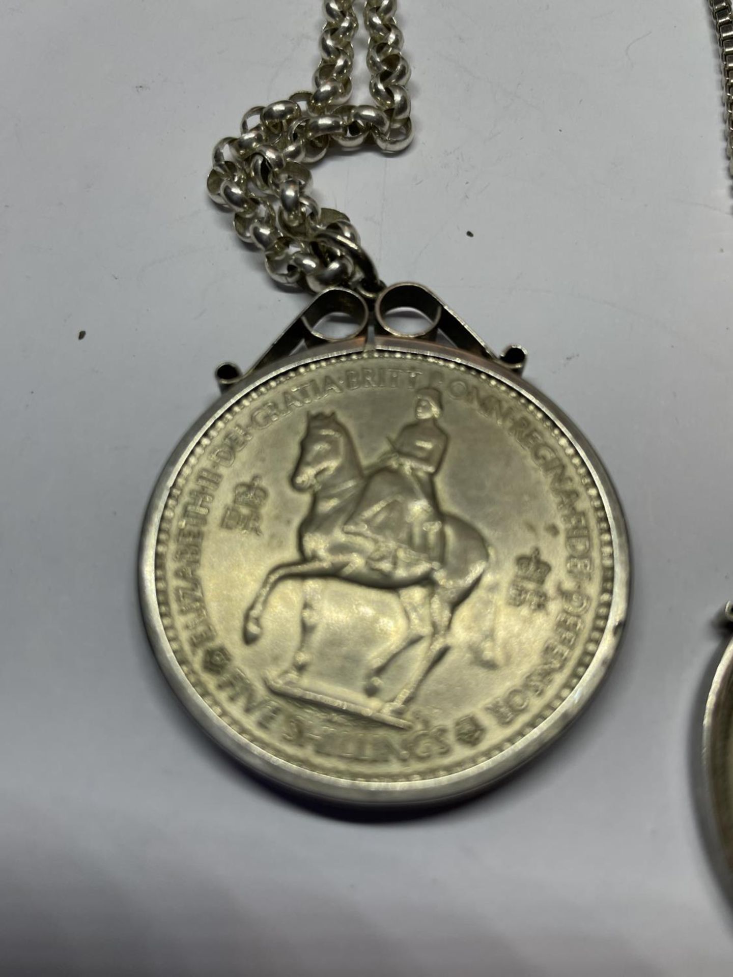 TWO MOUNTED COINS ON SILVER CHAINS TO INCLUDE A FIVE SHILLINGS AND A HALF CROWN - Image 4 of 6