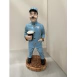 A LARGE MODEL OF A GUINESS ZOO KEEPER HEIGHT 41CM