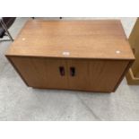 A RETRO TEAK G-PLAN E.GOMME TWO DOOR CUPBOARD, 32" WIDE