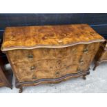A CONTINENTAL VICTORIAN WALNUT CHEST OF THREE DRAWERS ON CARVED CABRIOLE LEGS, 52" WIDE