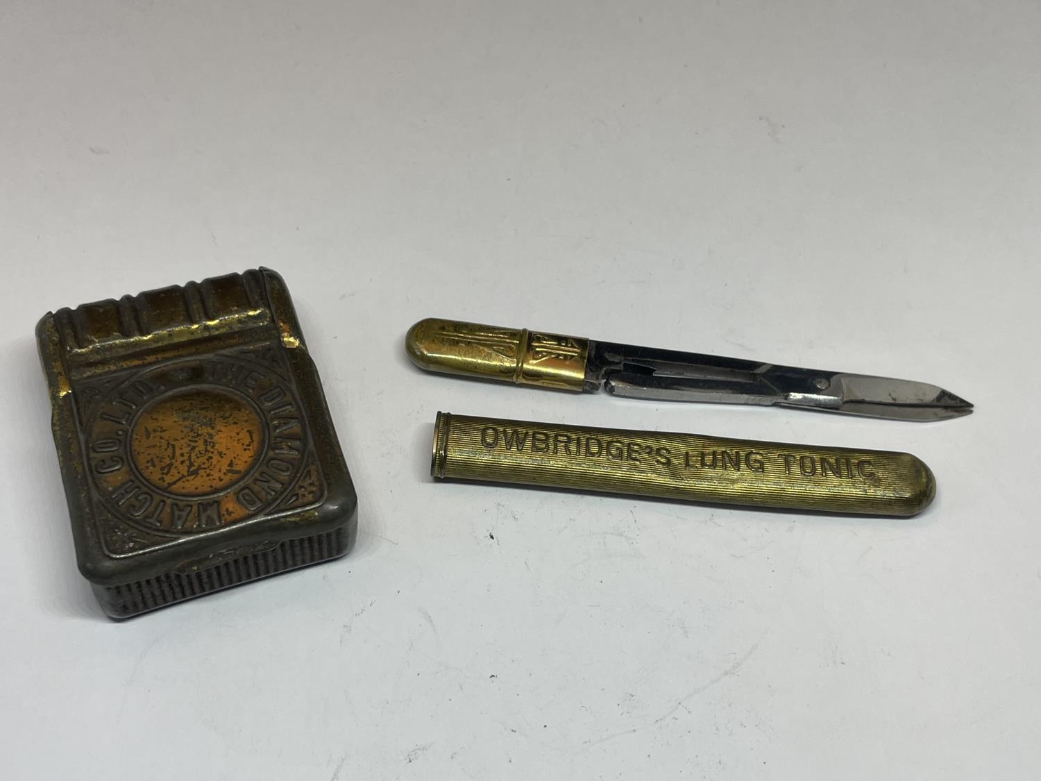 A VINTAGE METAL MATCH BOX AND A PAIR OF TRAVEL SCISSORS