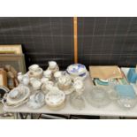 A LARGE QUANTITY OF GLASS AND CERAMIC WARE TO INCLUDE A JELLY MOULD, TRIOS AND PLATES ETC