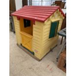 A LITTLE TIKES PLASTIC OUTDOOR PLAY HOUSE