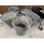 AN ASSORTMENT OF FIVE VINTAGE GALVANISED ITEMS TO INCLUDE THREE BUCKETS, A MOP BUCKET ETC